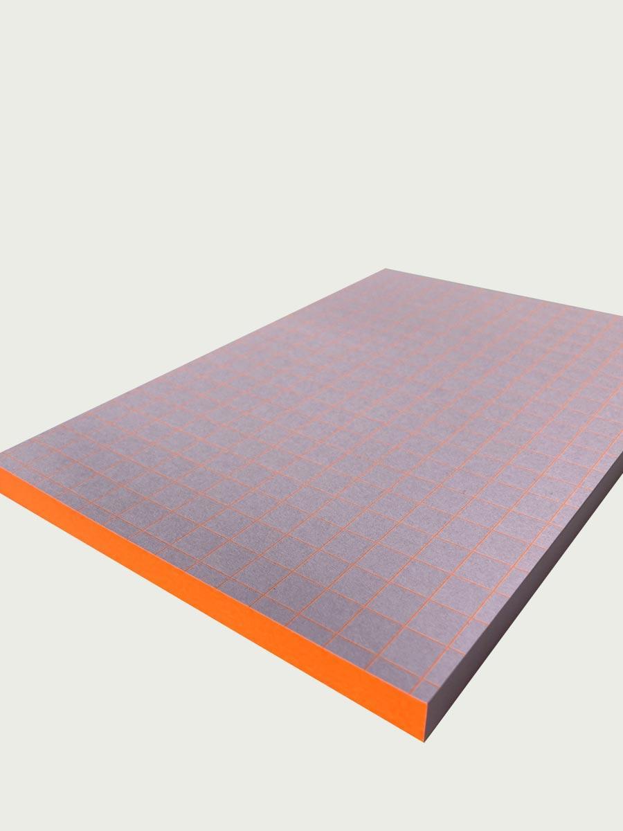 bloc note de bureau quadrillé quadrillage 1 cm orange fluo sur papier lila