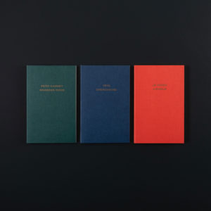 3 SOFT COVER NOTEBOOKS - TEXT - red green