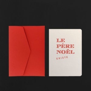 Carte postale LE PÈRE NOEL EXISTE champagne + enveloppe carmin